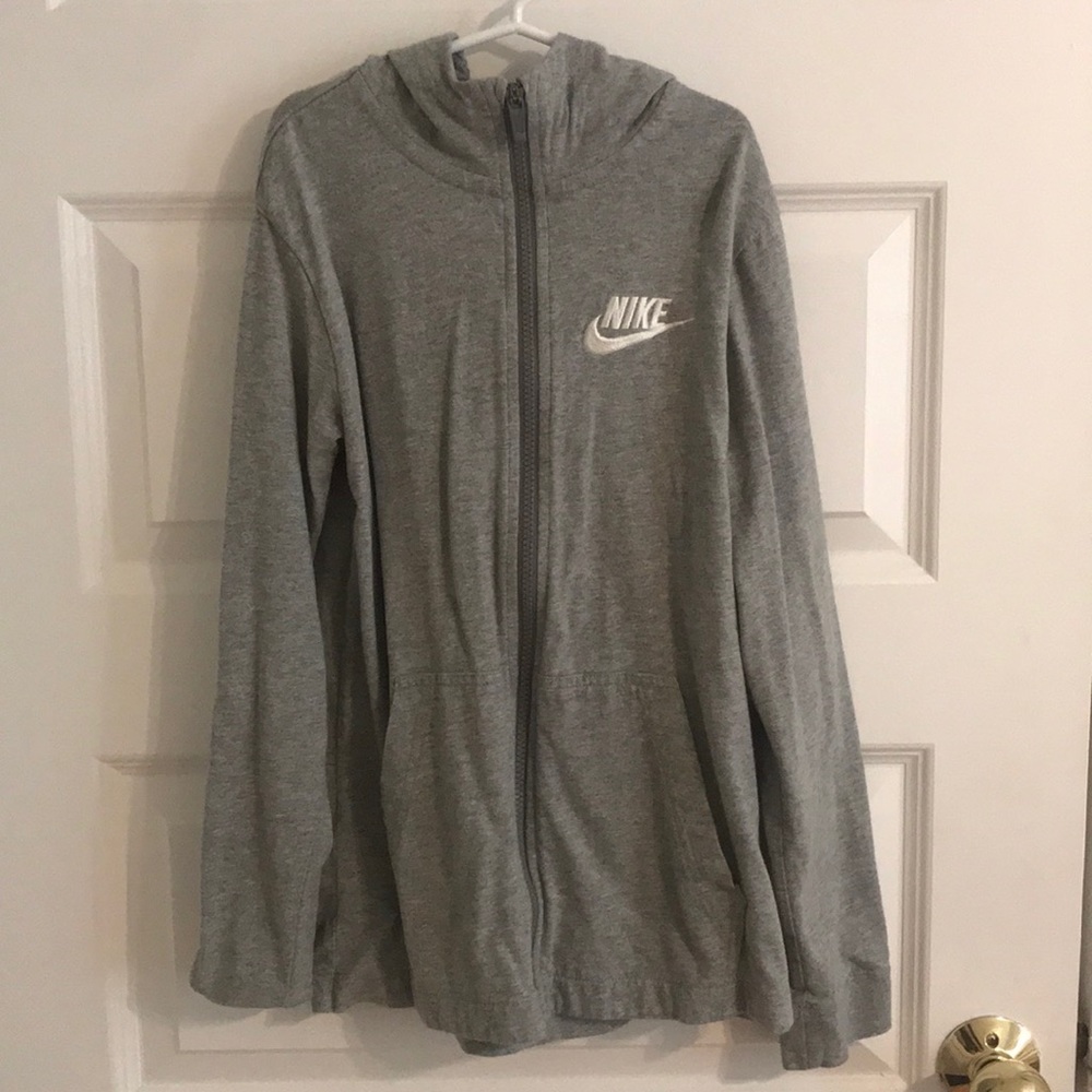 Unisex Nike kids zip up hoodie.